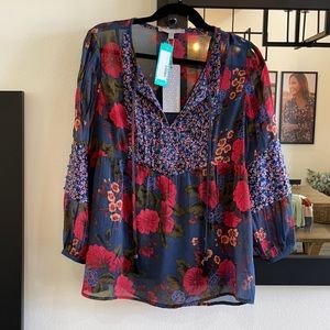 Daniel Rainn Floral Blouse. New with tags. Size medium. Attached tank undershirt